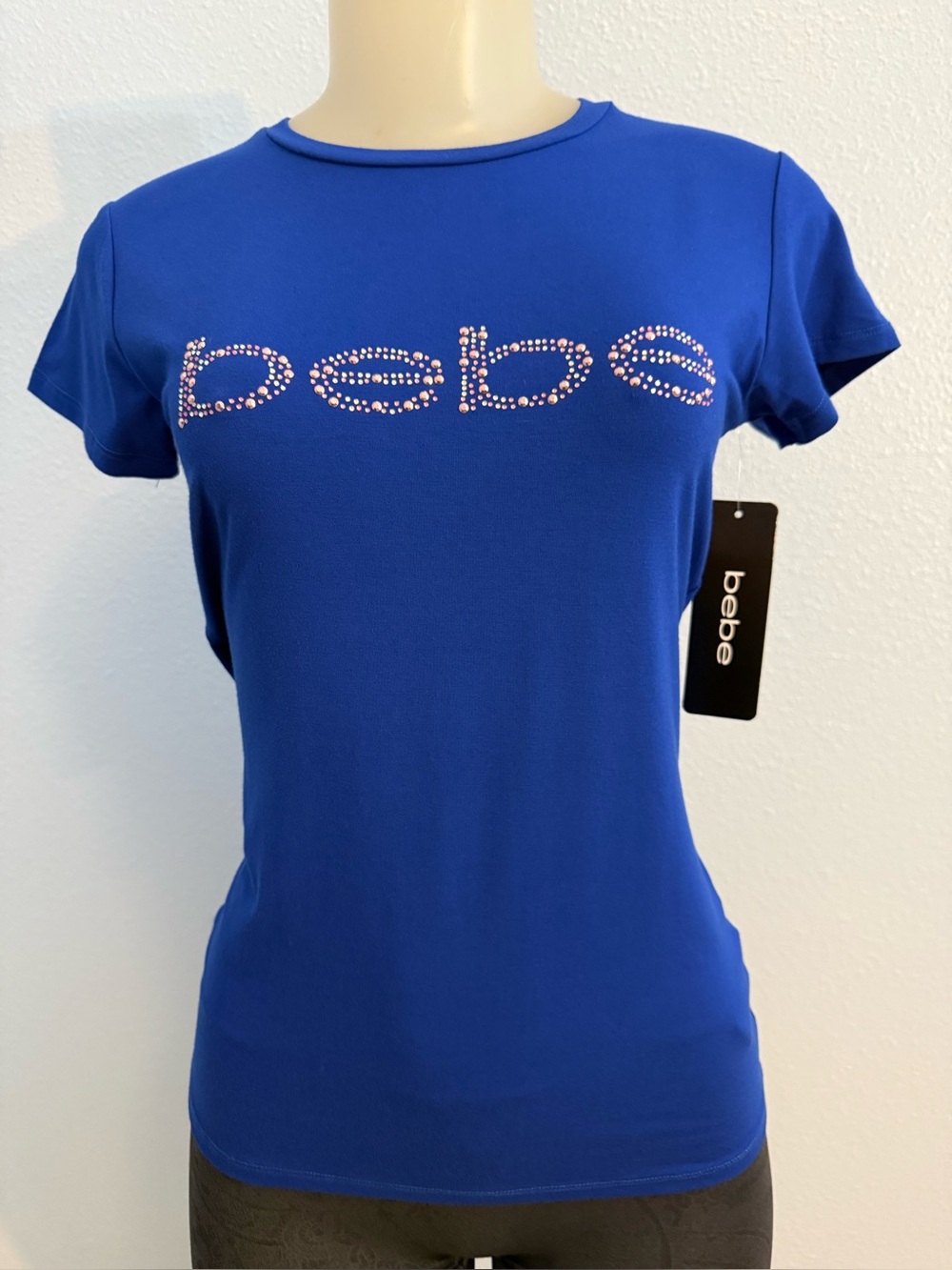 BEBE Women's Top Blue with Silver and Pink Logo print. New with tags